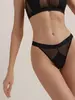 Трусы женские «танга» из хлопка и эластичной сеточки RIB WITH MESH LTA 2495 black
